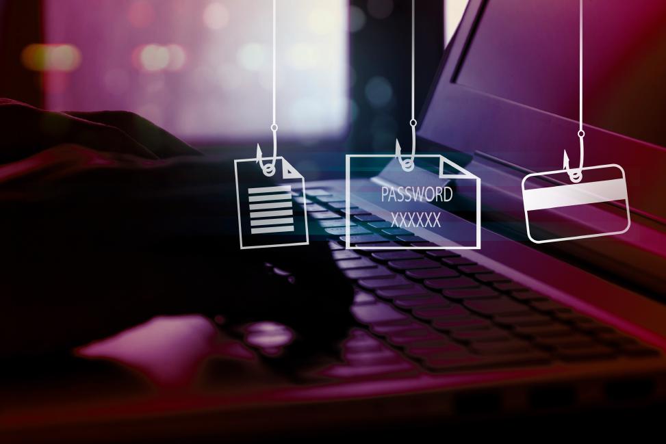 Attackers use phishing attacks to obtain sensitive information A document, a password and a credit card are hanging on fishing hooks that were stolen by an attacker sitting in front of a laptop using a phishing attack.