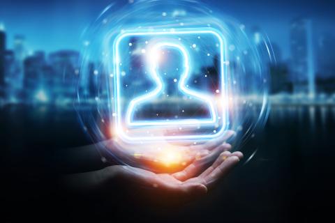 Hand holding a digital blue holographic user interface symbolizing created user account without sign-in up with an e-mail